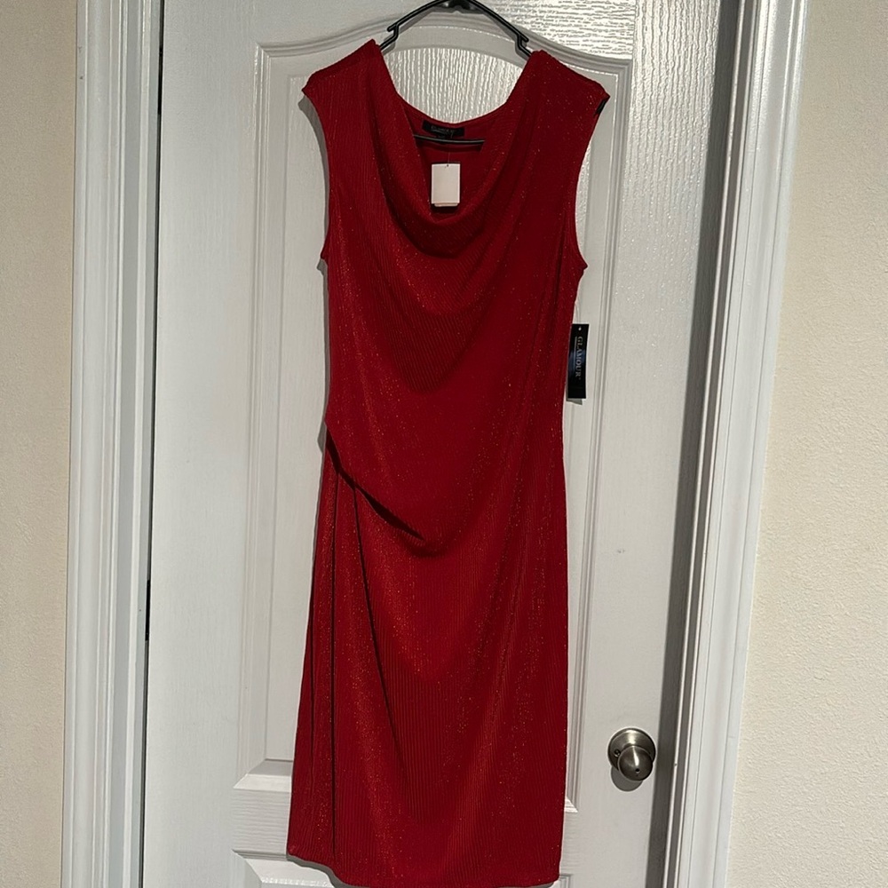 Beautiful red dress. Has the appearance of shimmering with drop neckline.